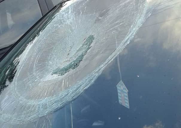 Thugs smash car in Taghnevan