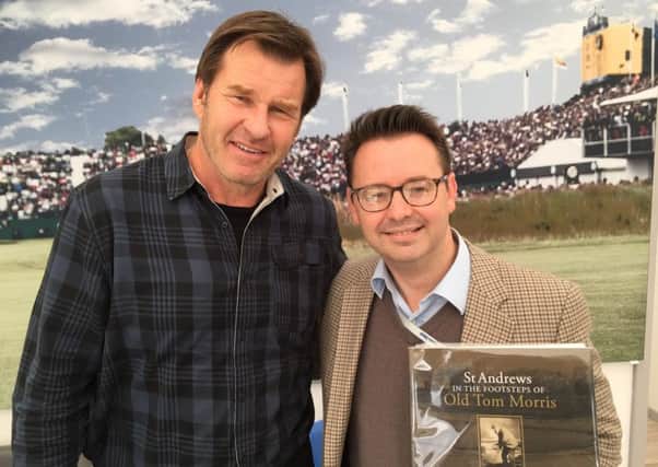 Roger pictured with golfing legend, Sir Nick Faldo, who personally requested Roger to sign his copy of the book.