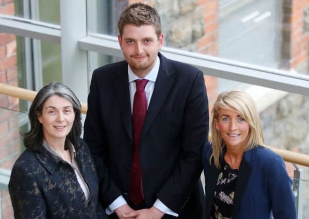 The chair and vice chair of the Community Planning and Regeneration Committee, Cllr Phillip Brett and Cllr Roisin Lynch, with the council's director of community planning and regeneration, Majella McAlister (right). INNT 31-500CON