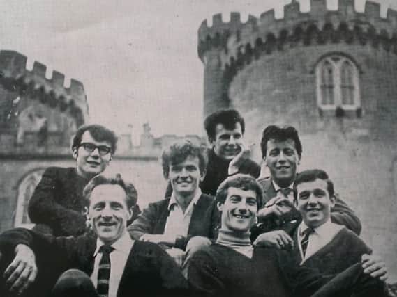 The Snowdrifters Showband  from Cookstown pictured in front of Killymoon Castle 46 years ago - from left back row J. Fields, T. McGeown, A. Fields, N. Glenn. Front row, G. Wilson, R. Greer, R. Hamilton. The band played to thousands of dancing fans all over the country during the showband boom back in the 60's and 70's. Does anyone remember their signature tune 'North To Alaska'?