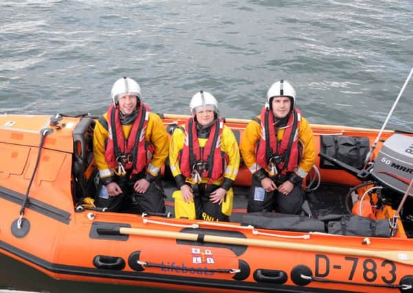 Pictured in the new lifeboat are (L-R) Scott Leitch, Catherine Callaghan and Jason Torbitt. INLT-31-704-con