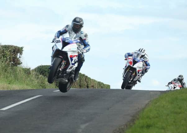 Guy Martin gets things a bit out of control when being chased by William and Michael Dunlop. Picture: Roy Adams.