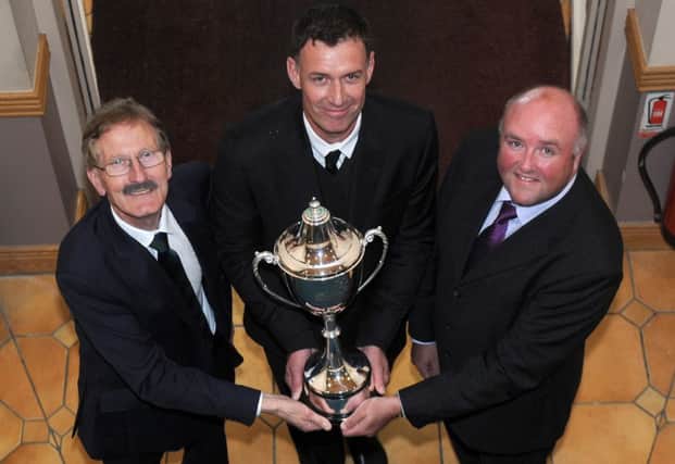 Victor Leonard, Chairman of the Dale Farm Milk Cup Organising Committee, Chris Sutton, former Chelsea and Blackburn striker and Jason Hempton, Commercial Director, Branded Products, Dale Farm;  pictured at Lodge Hotel prior to the Opening Ceremony of the 2015 Milk Cup.  Picture By Declan Roughan / Presseye
