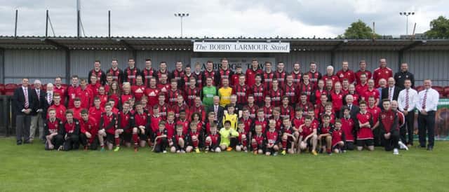 Banbridge Town teams and Officials lined out before the start of the Bobby Larmaour Cup Final at Crystal Park ©Paul Byrne Photography INBL1530-235PB