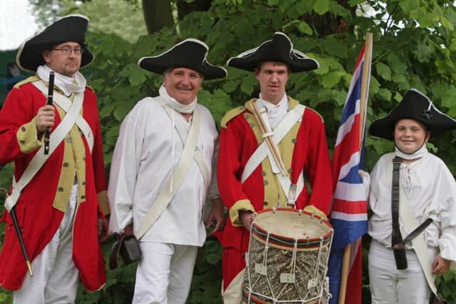 LEAD ON. Tony, Peter, Richard and Evan dressed in Napoleonic times on Saturday.INBM31-15 019SC.