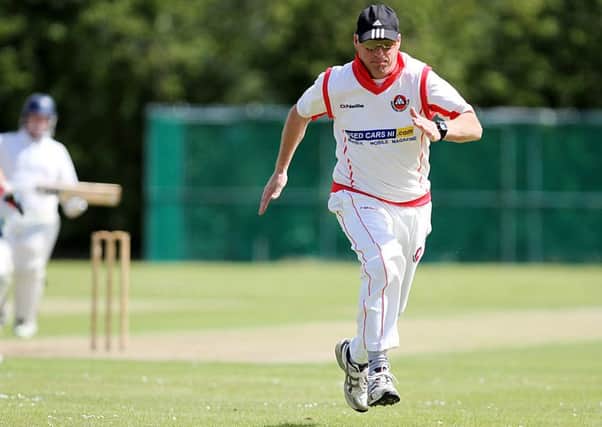 Drummond's Andy Christie runs to try and stop a boundary against Burndennett on Saturday. INLV3115-206KDR