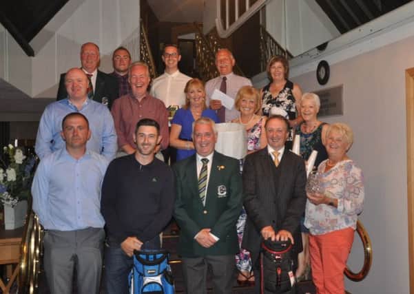 Prize winners from Faughan Valley's Frank McClintock's Captain's Day. Front Row from left: Billy Hutchman, Michael Kelly, Frank McClintock (Captain), Kevin Hunter and Marion Sayers. Middle row Martin McDermott, Raymond Lavery, Celine McIvor (Lady Captain), Evelyn Smith and Majella Heaney. Back row Cecil King, Lee Totten, Tony P Griffiths, Malcolm Riddell and Catherine O'Neill.