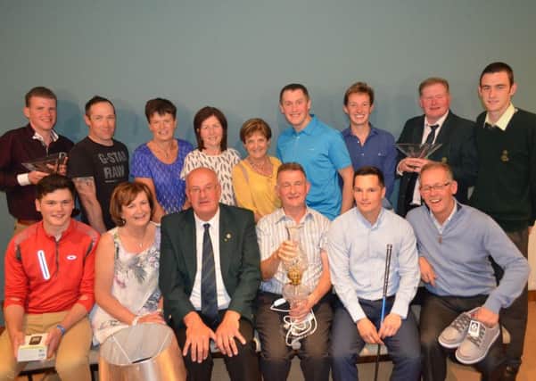 Mr Peter Fallon's Captain's Day prize winners front row left to right: David Knox Jun Juvenile Winner, Nicky Fallon Lady Winner, Captain Mr Peter Fallon, Jack Mc Ateer Winner, Anthony Jackson Third and John McDowell Fourth. Back row left to right Sean McCafferty Visitor, Gary Kennedy Back 9, Lorna Thompson Third, Margaret Killen Second, Irene Cosgrove N/P, John Lafferty Cat 17 +, Chris Lynch Past Captain, Junior Captain Ryan Harkin Rep and Jack Kennedy Juvenile Second.