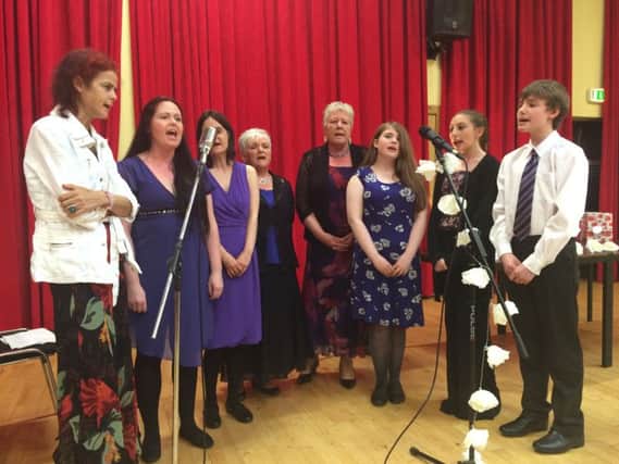 Samantha McMillan, who teaches flute and singing lessons at St Patrick's Parish Centre recently held an Oscars evening for her pupils, who performed to 150  family and friends. 35 students took part in the show, as well as Atlas Choir and some singers from St Patrick's Youth Group. Pictured is the Atlas Choir