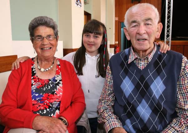 Tommy and Nelly Millar with their grand daughter Lydia Hamilton at the Spark Tea Dance. INBT32-207AC