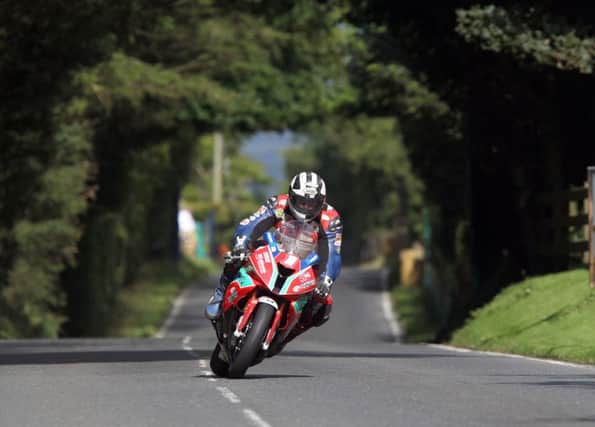 Michael Dunlop in action at the 2014 Metzeler Ulster Grand Prix.