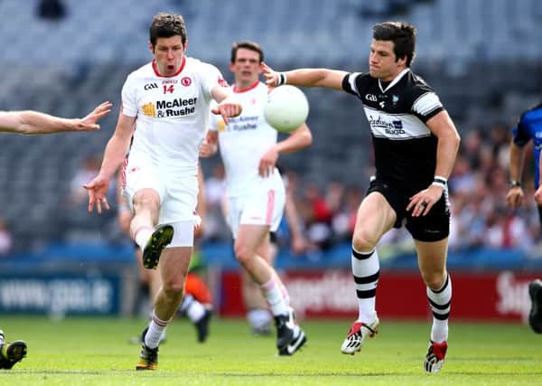 Sligo's Brendan Egan and Sean Cavanagh of Tyrone. Pic: ©INPHO/Cathal Noonan
