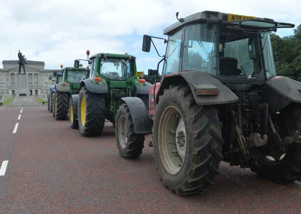 MP Gregory Campbell appeals for EU aid for farmers, who get about 19p a litre for milk. They say they need about 27p a litre to break even.  Photo: Colm Lenagham/Pacemaker