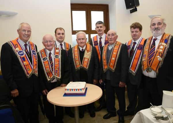 Officers and long serving members of Kildoag L.O.L. 1164, from left, Winston Boyd, Ernie Hamilton, Mark Moore, William Scobie, Gavin McCombe, WM, Jack Campbell, Stuart Parkhill and Stanley McCombe, pictured at the 80th anniversary celebrations at Kildoag Orange Hall on Friday evening. INLS3115-121KM