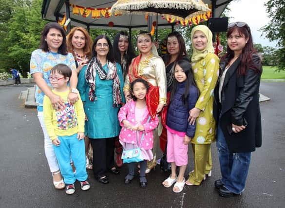 Some of the performers who entertained the crowds during the Wallace Park Mini Mela, part of the council's Park Life programme of events. US1531-520cd  Picture: Cliff Donaldson