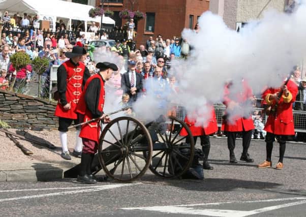 The thick smoke of the cannon spreads out during last year's Relief of Derry Pageant at Carlisle Circus. INLS3214MC054