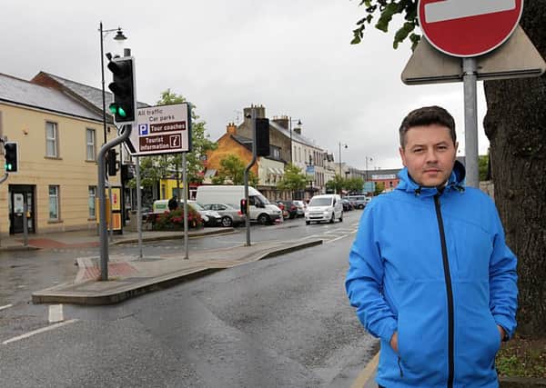 DUP Councillor Alan Robinson, pictured in Catherine Street, Limavady, where five new businesses have opened in the past month. INLV3215-174KDR
