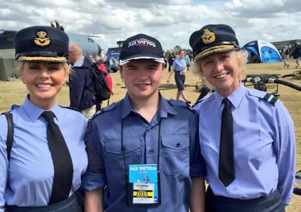 Cadet Corporal Luke Crymble of 2062 (Carrickfergus) Squadron Air Training Corps with Air Cadet Ambassador, Honorary Group Captain Carol Vorderman, and the Air Cadet Commandant, Air Commodore Dawn Cafferty.  INCT 31-721-CON