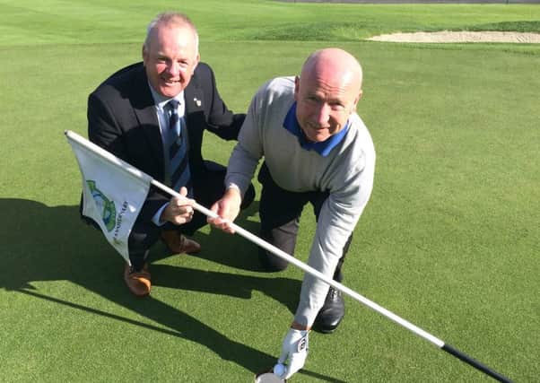 Eddie Donaldson (Captain) congratulating Eddie O¹Neill on his Hole-in-One at the 9th Hole.