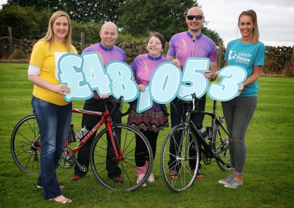 Anne McRobert (Marie Curie) and Susie Colledge (Cancer Focus) are pictured with Paul McToal, Cathy Fyfe and Damien McAuley who raised £48,053 from the annual D-Frog Cycle. INBT33-213AC