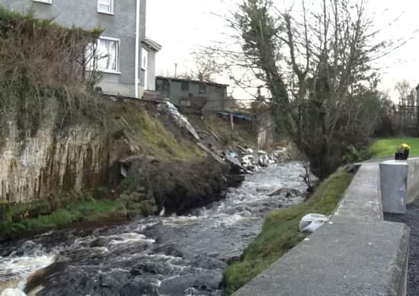 Flanagan's left worrying their home would collapse into river too