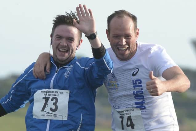 Enjoying a laugh during the Rathfriland 10K are Allen Ervine and James Costello ©Paul Byrne Photography INBL1531-259PB