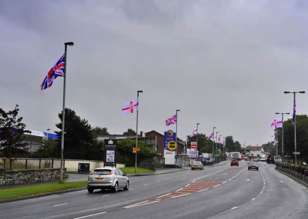 Contentious flags flying along Glendermot Road in the Waterside. DER3115GS16