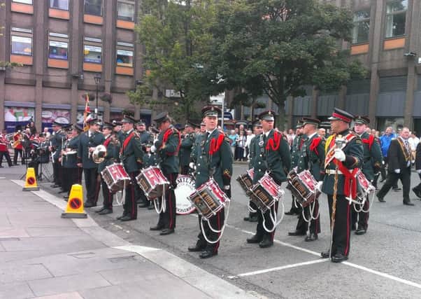 Hamilton Flute Band lead the parade as a tribute to The Derries