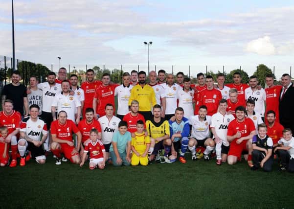 The combined teams of Ballee Liverpool and Manchester United Supporters Clubs pictured prior to their annual charity match raising money for Spina Bifida and Hydrocephalus. INBT33-230AC