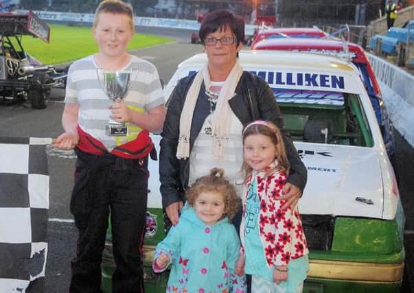 Alison Eliott presents the Broughshane Car Dismantlers Trophy to Junior Rod winner Matthew Milliken with help from Chloe Graham and Lillie-Mae Smyth (Davy Park pic)