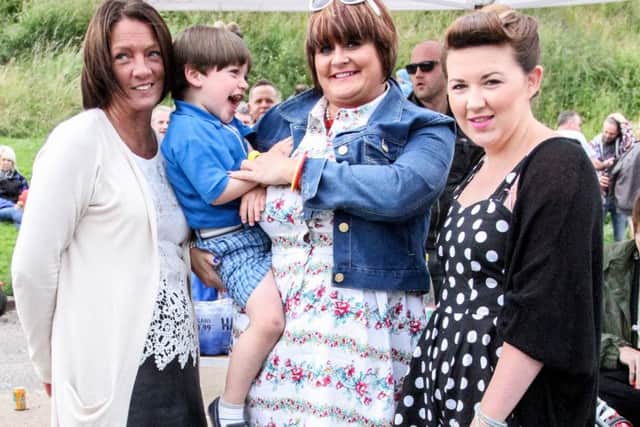 Joanne O'Neill, Mel Hill, Ruth Hughes, and Lucas Campbell at Blackhead car park for the Mods and Rockers rally. INNT 32-520-SO