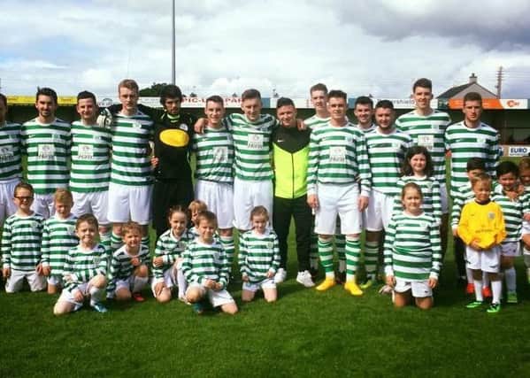 Lurgan Celtic mascots with the team at Loughgall on Saturday