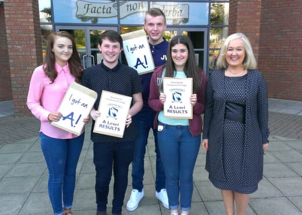 Hazelwood College principal Kathleen O'Hare with A Level pupils Jodie McFarlane, Mark Buick, Jack White and Amy Garner. INNT 34-507CON