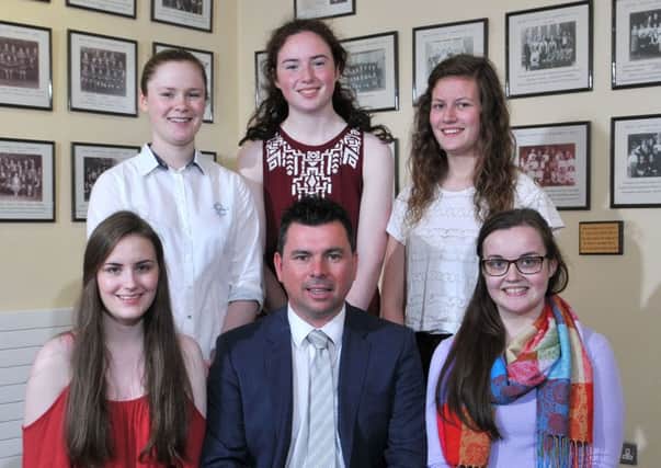Students from the Rainey Endowed School Magherafelt who achieved 4 grade A's at AS Level. They are Sophia Burns, Rebecca Currie, Diane Forsythe, Niamh McGuckin and Aine Scullin. Included in the picture is Mr Mark McCullough (Headmaster).INMM3415-336