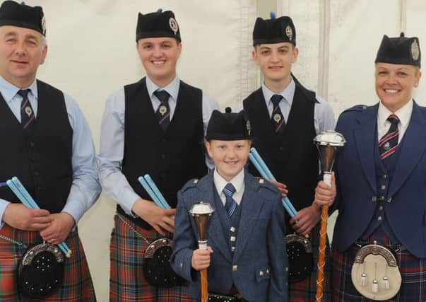 Adrian Hoy, Marcus, Matthew and Abigail Wenlock and Paula Braiden pictured at the weekend's pipe band contest in Moira.