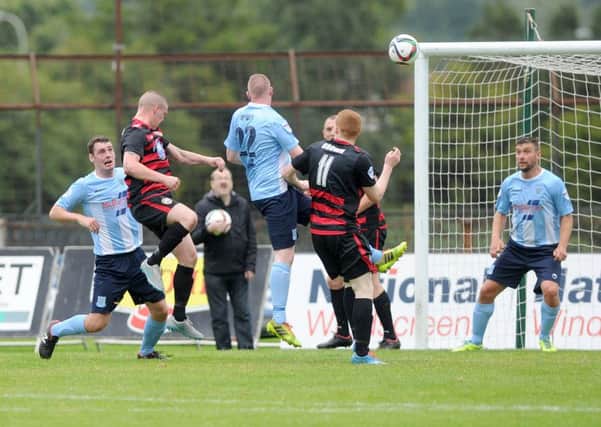 Ballymena United's deficiencies when defending set pieces was once again highlighted as Aaron Canning headed Coleraine's second goal  in Saturday's game. Picture: Press Eye.