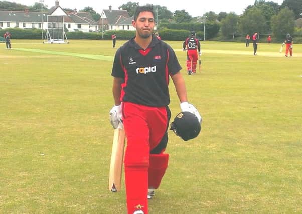 Ruhan Pretorius makes his way off after his match winning knock of 112 against Pembroke.
