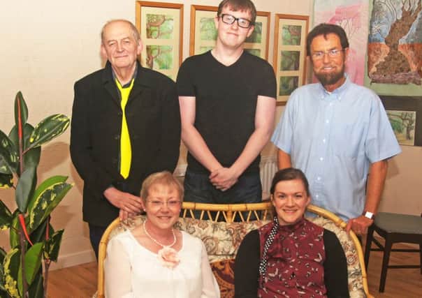 Ad Hoc Theatre will perform 'Natural Causes' on Thursday 3 & Friday 4 September at  8.00pm in the Braid Arts Centre.  Admission: £8.00 & £6.00 concession. Back Row: L to R, Jimmy Murray, Michael Grey, Alec Murphy. Front Row: L To R, Jenny McCarley, Christine Clarke.
Synopsis: Celia is suicidally depressed, her husband, Walter is in love with his secretary, Angie. Vincent, a purveyor of poison is called in to simplify matters, while Withers, from the Samaritans is in the business of saving lives. If the rubber plant could speak it would have strong grounds for complaint