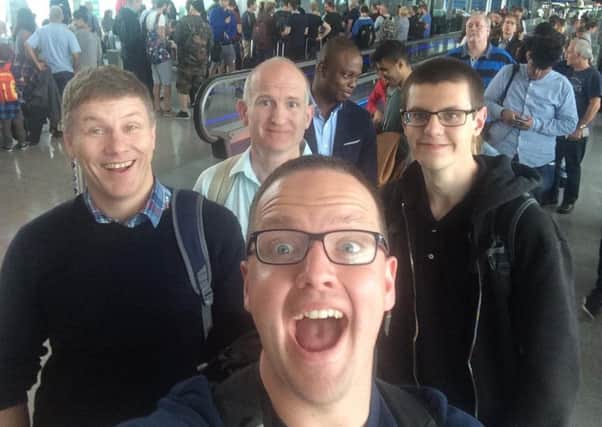 Just before they left Dublin Airport: the Revd Andrew Thompson and Dr Thomas Murray from Donaghcloney, along with their fellow team members.