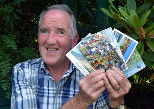 Cathal the singing breadman with some of the many postcards from all over the World which reached him despite not having the correct address. INLM35-201.
