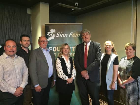 Sinn Fein election candidates for the area, John O'Dowd and Catherine Seeley pictured with some of those who attended last week's selection meeting. INBLsinnfein1