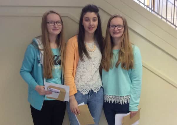 Emma McConville, Cliodhna Campbell and Rebecca McConville receive their GCSE results at Saint Patricks College.