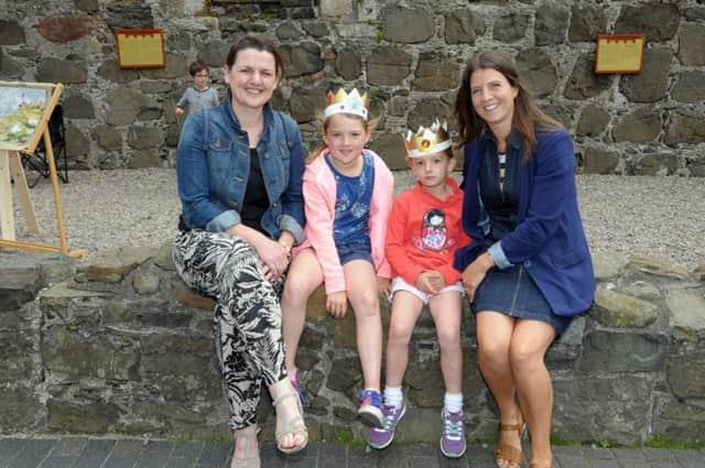 Enjoying the fun at Carrick Castle are Laura and Megan Williams and Erin and Kerry Graham. INCT 34-237-AM