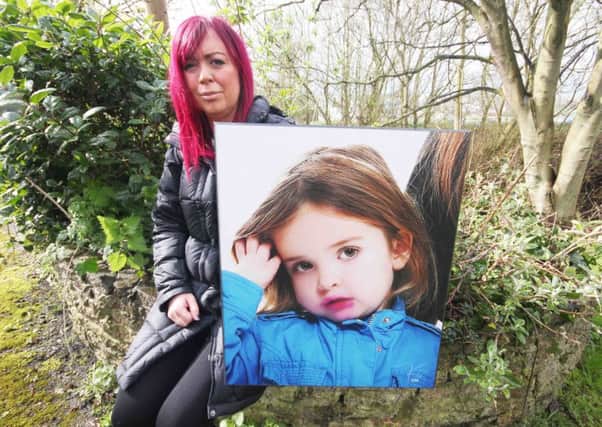 Andrea McAleese, with a picture of her beloved daughter Roma who died five years ago, at the site where an Angel of Hope  Memorial Garden will be situated beside the Coleraine Borough Council offices on the Portstewart Road. PICTURE MARK JAMIESON.