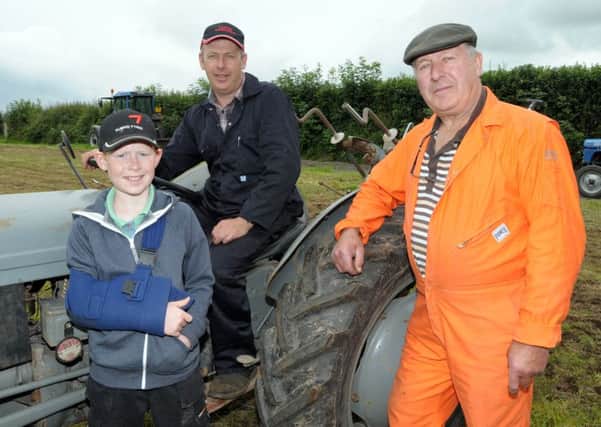 Taking part in Ballynure Vintage Ploughing match are 3 generations of the Lemon family, David Snr. David Jnr. and Jonathan. INLT 34-203-AM