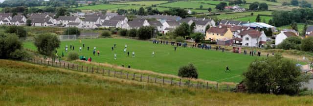The scene in Cargan on Saturday where Glenravel played their first game on their new pitch as they took on All Saints Old Boys.