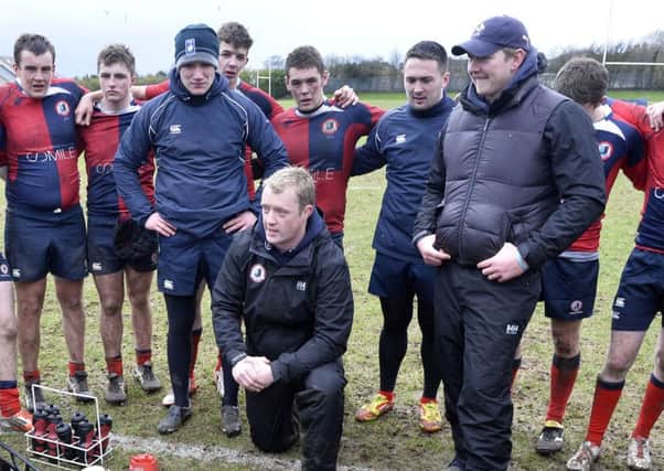 Mike McKeever (centre), seen here during a Ballyclare High School match, is the new coach at Ballyclare Rugby Club. INLT 35-928-CON Photo: Presseye