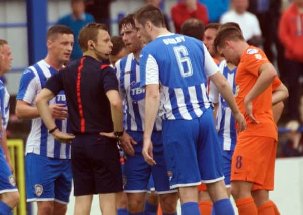 The moment Coleraine's challenge to Linfield faded when David Ogilby was sent off for a non-exsistant challenge. Despite Linfield's Andy Waterworth informing the referee there was no contact, Ogilby was harshly sent to the dressing room for two yellow cards.