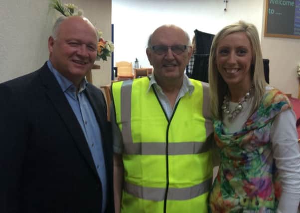 Rodney McCarthy, one of the volunteers behind the St Saviour's event, pictured with DUP MP David Simpson and Councillor Carla Lockhart.