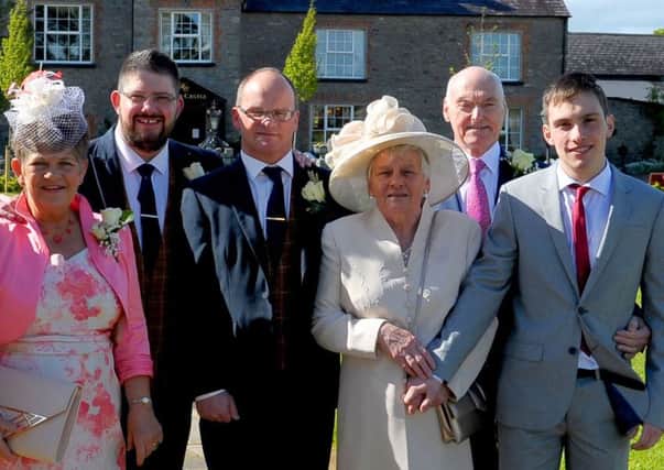 The civil partnership at Darver Castle in Dundalk - left to right - Craig's mother Agnes, he happy couple Craig Truesdale and Helen and William Crossey, Alkstair's parents, and Johnathan Crossey, Alistair's son from his previous marriage.